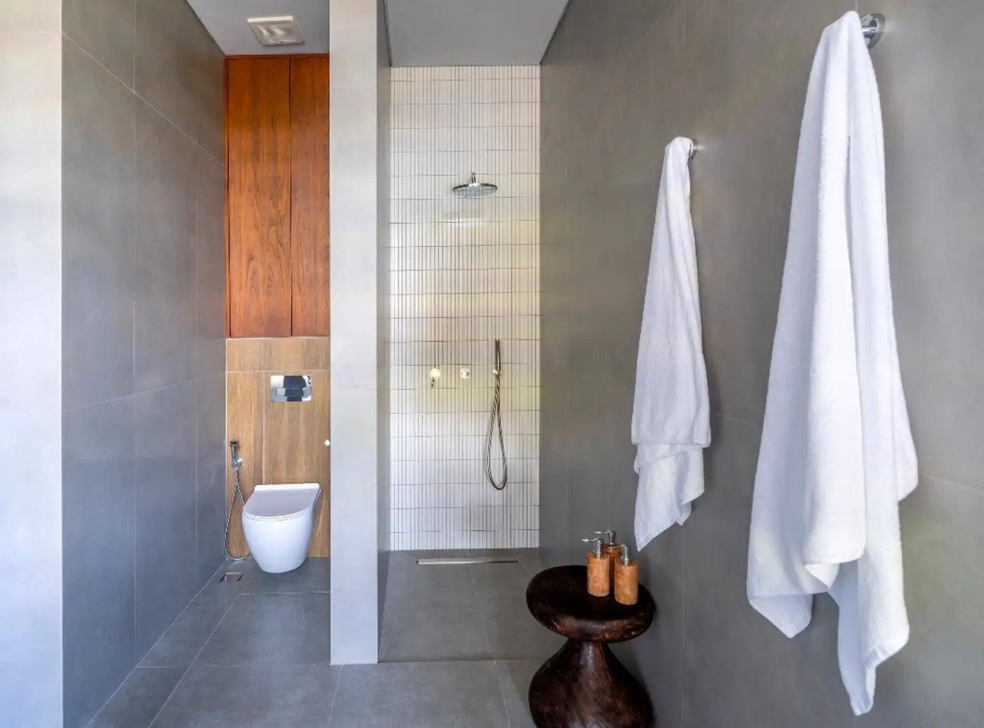 Walk-in shower and micro-cement bathroom at Meditation House, Ubud